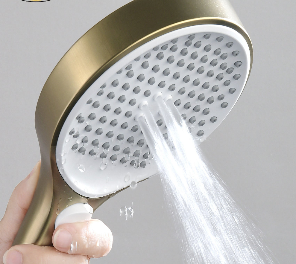 Thermostatic brushed gold shower set.